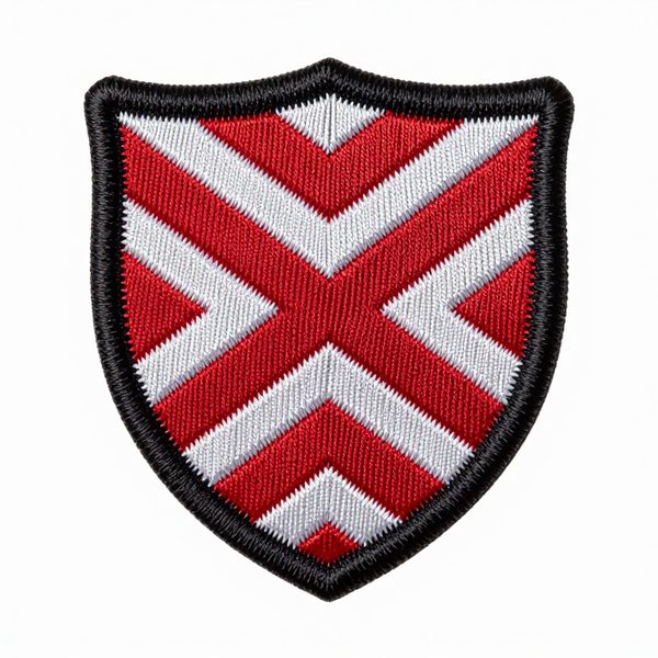&Eacute;cusson brod&eacute; en forme de blason